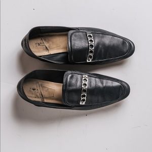 Loafer/ Slipper shoes with metal silver detail.